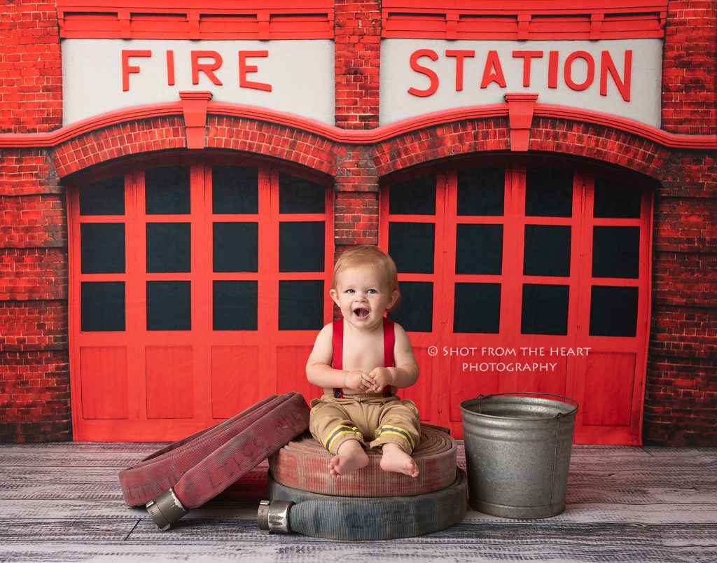 baby firefighter in turnout gear photography