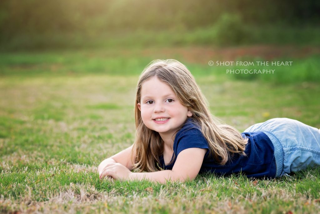 smiling kid in grass, summer, child photography, Cartersville Georgia