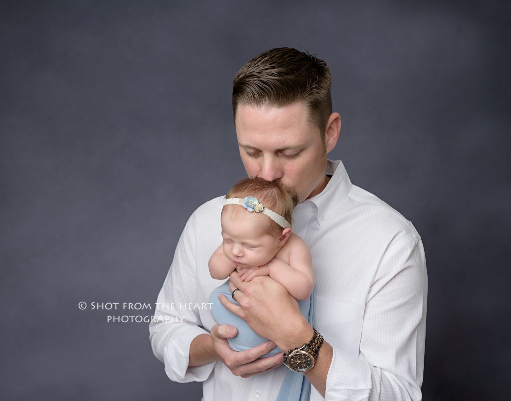 dad with newborn baby photography