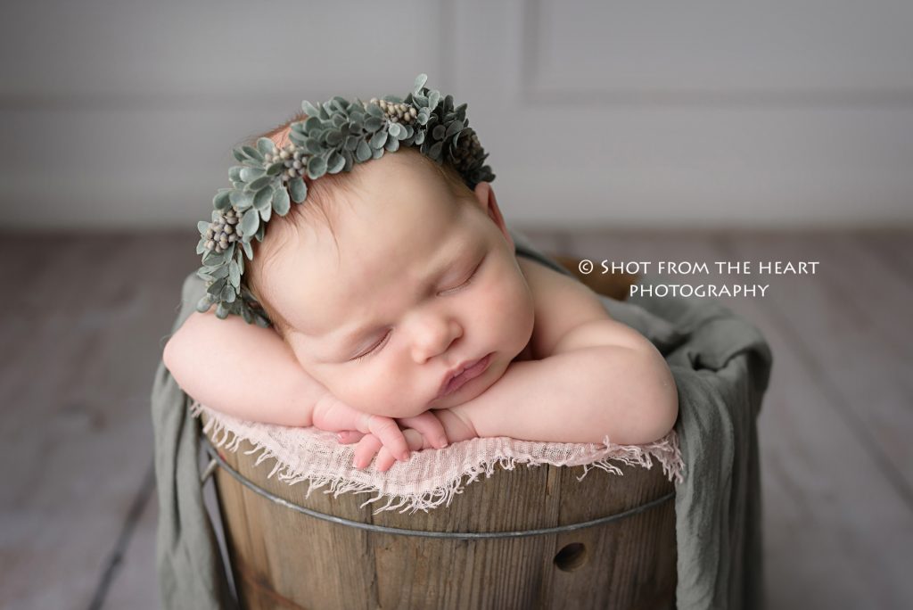 Newborn baby photography in rustic bucket Alpharetta Georgia 