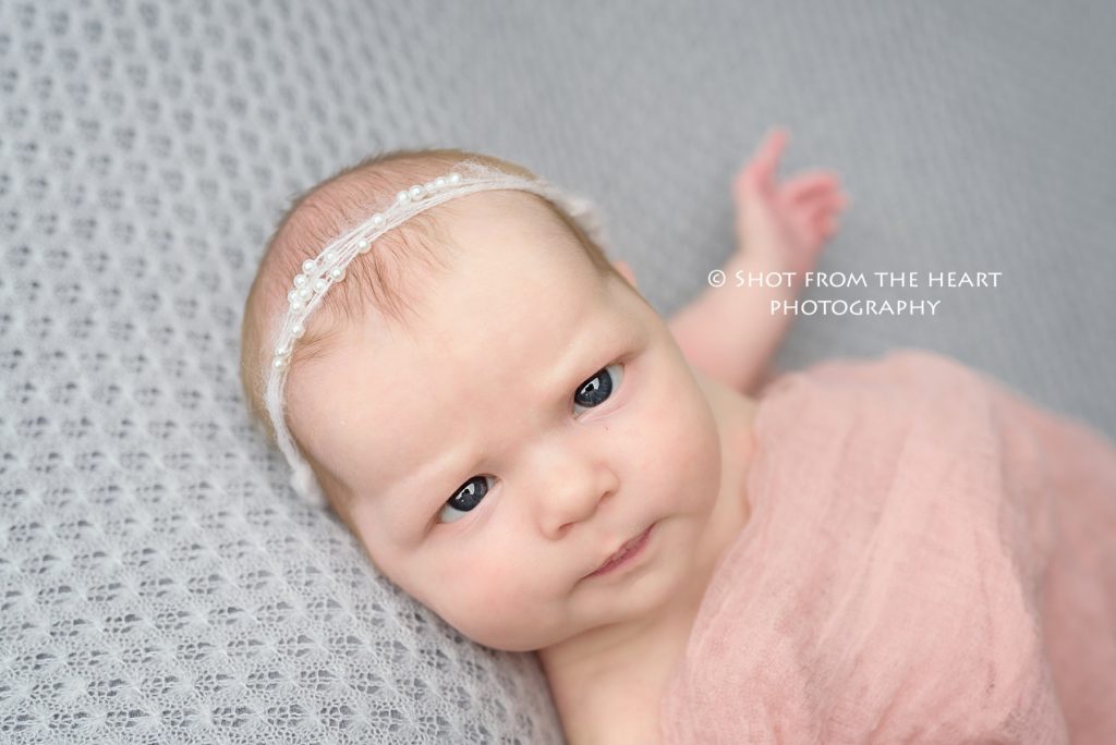 funny newborn expression, perplexed confused baby, Alpharetta Georgia photographer 