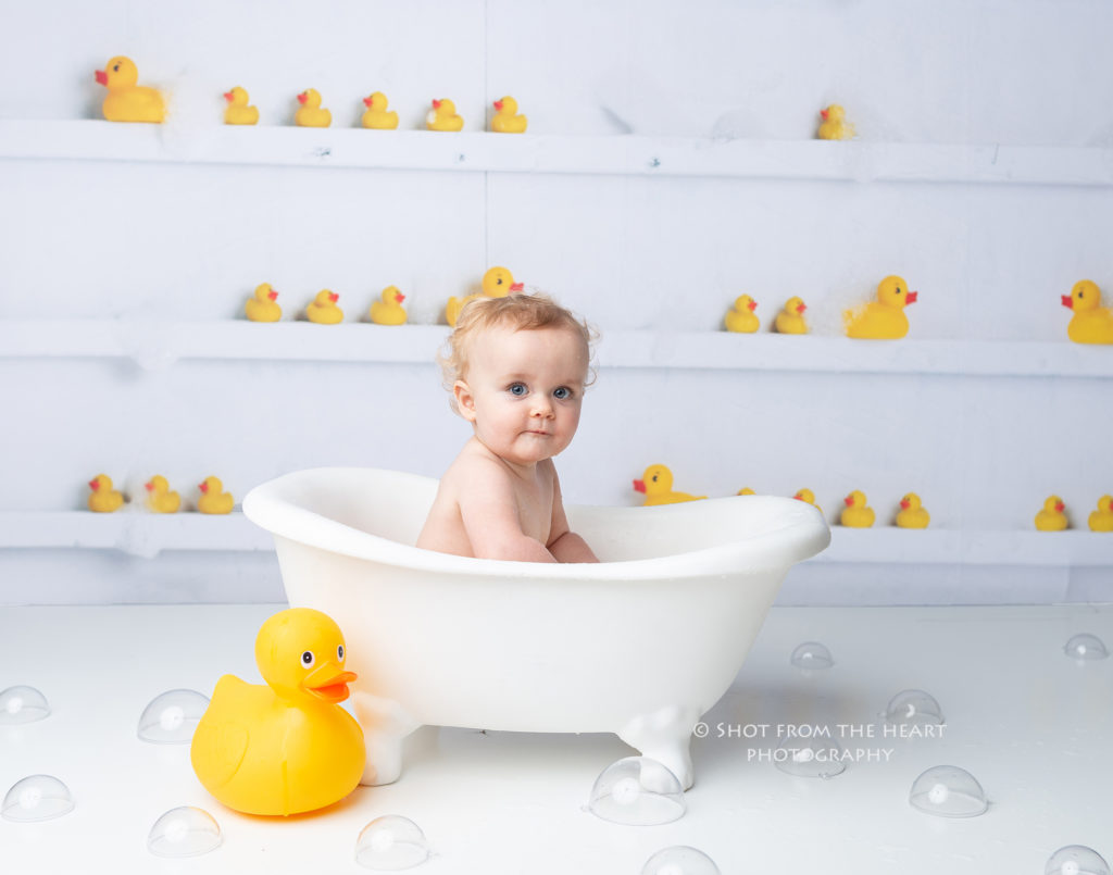 rubber ducky bubble bath after babies first birthday cake smash session
