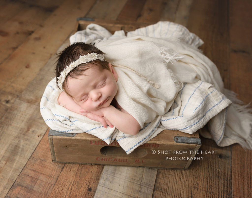 newborn baby photography in crate rustic wood neutral