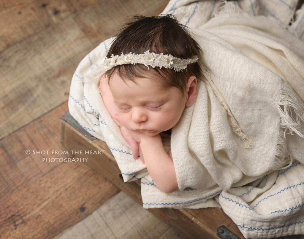 rustic newborn baby photography neutral wood crate